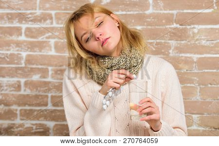 Woman Tousled Hair Scarf Hold Glass Water And Tablets Blister. Girl Feels Ill Suffer Fever And Take 