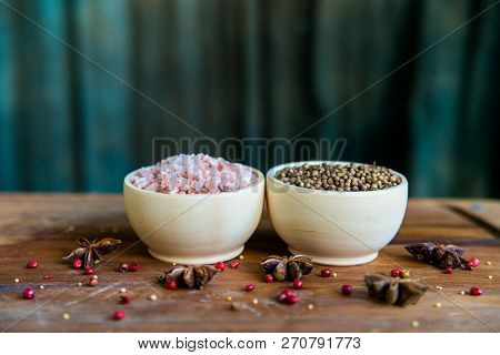 Himalayan Salt And Coriander Seeds In Bowls