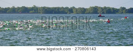 Grafham, Cambridgeshire, England - May 21, 2017:  Competitors Swimming At The Beginning Of The Swimm