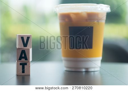 Wooden Blocks With Letters Vat. Vat Is Acronym From Word Value Added Tax. Vat Payment From Customer 