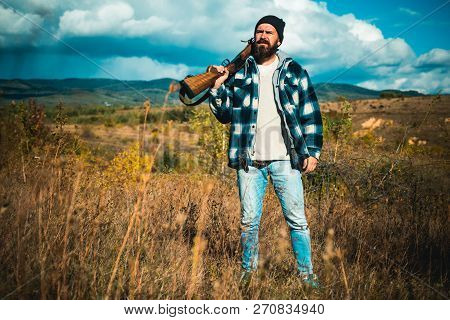 Hunter With Shotgun Gun On Hunt. Closed And Open Hunting Season. Deer Hunt