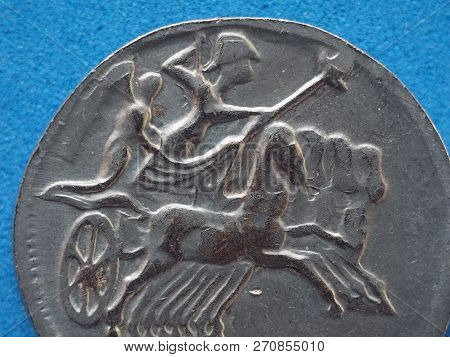 Ancient Roman Coin With Horses And Biga (chariot)