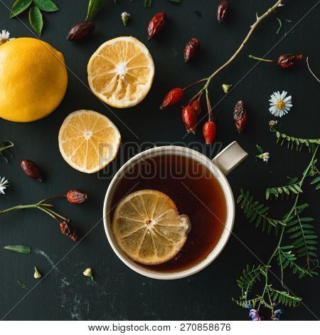 Rose Hip Herbal Tea Flt Lay Top View With Slice Of Lemon On Wooden Table