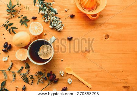 Rosehip Herbal Tea Flt Lay Top View With Slice Of Lemon On Wooden Table