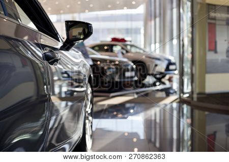 Car Auto Dealership. New Cars At Dealer Showroom. Prestigious Vehicles.