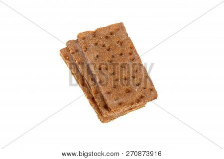 Three Slices Of Crsip Bread Stacked Isolated On White Background.