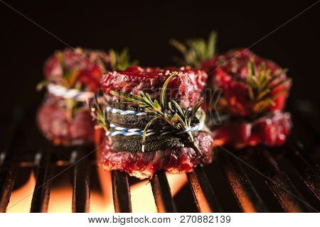 Fresh Fillet Steak On Grill With Flammes.