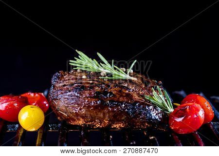 Fresh Fillet Steak On Grill With Flammes.