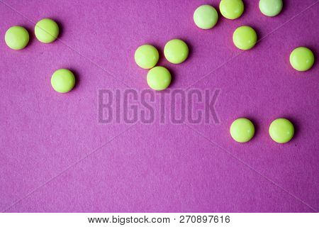 Small Yellow Orange Beautiful Medical Pharmaceptic Round Pills, Vitamins, Drugs, Antibiotics On A Pi