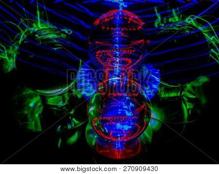 An Abstract Light Painting And Ghosting Of The Back Lensball Image.