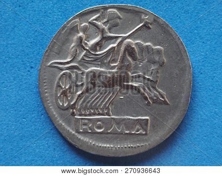 Ancient Roman Coin With Horses And Biga (chariot)