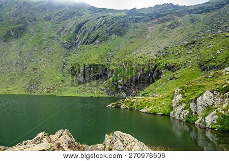 The Glacier Lake Called Balea (balea Lac) On The Transfagarasan Road From Fagaras Mountains