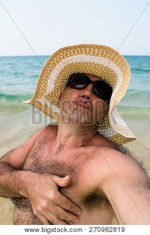 A Parody Of Fashionable Selfie Girls On The Beach. Self Portrait With Humor.