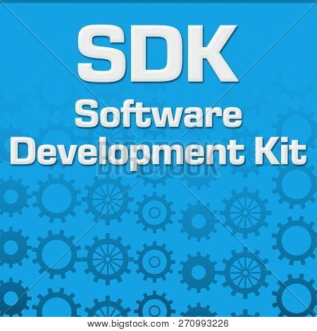 Sdk - Software Development Kit Text Written Over Blue Background With Gears.
