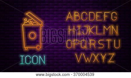 Glowing Neon Line Trash Can Icon Isolated On Brick Wall Background. Garbage Bin Sign. Recycle Basket