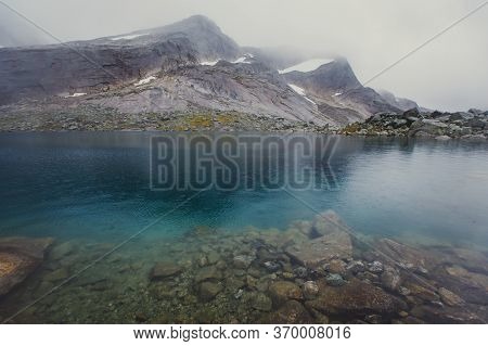 Norwegian Mountain Landscape During Hiking To Halls Fortopp Peak, With A View On Stetind, Northern N