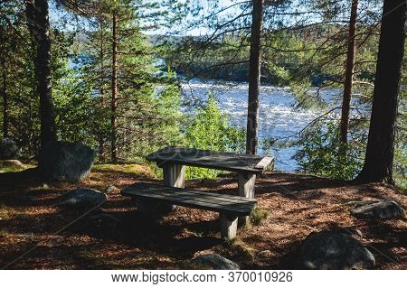 View Of Kalix River, Kalixalven, Overkalix Locality And The Seat In Norrbotten County, Sweden, With