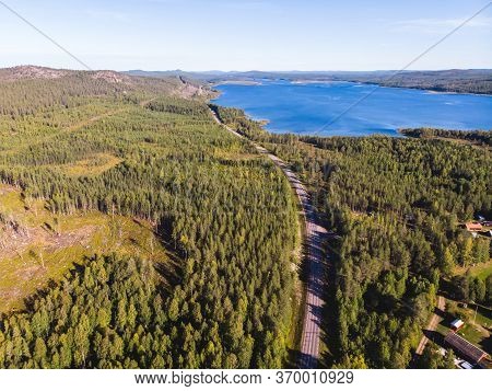 View Of Kalix River, Kalixalven, Overkalix Locality And The Seat In Norrbotten County, Sweden, With