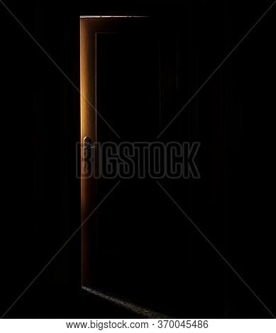 Dark Door With Glow Behind, Light In The Dark Through The Ajar Door, Hope
