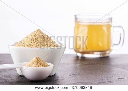 Powder And Maca Root Drink In A Glass - Lepidium Meyenii