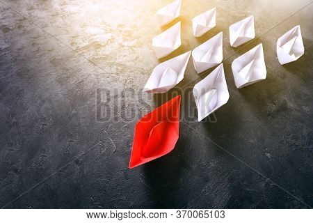 Leader Concept With Red Paper Boat Leading White Paper Boats