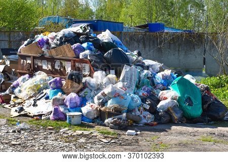 Moscow. Russia. May 2020. Big City Garbage. Container Littered With Garbage. Ecological Catastrophy.