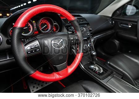 Novosibirsk/ Russia - March 04, 2020: Mazda 6, Dark Car Interior - Steering Wheel, Shift Lever And D