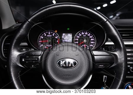 Novosibirsk/ Russia - March 31, 2020:  Kia Rio, Auto Interior: Steering Wheel With Red Logo  Kia  An