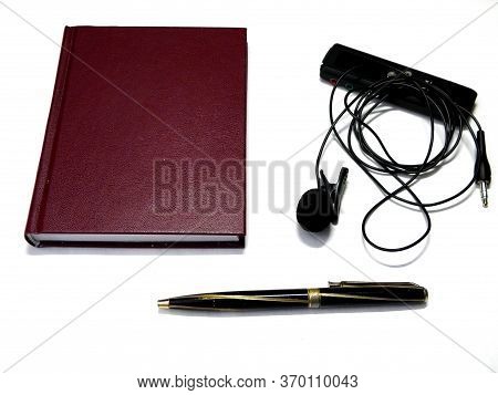 The Diary And Pen Are On The Business Writing Table