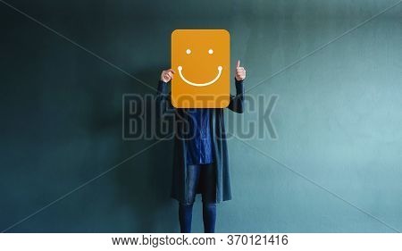 Customer Experiences Or Human Emotional Concept. Woman Giving Thumbs Up And Showing A Happy Face Emo