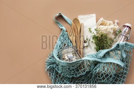 Cotton Bags, Net Bag With Reusable  Glass Jars, Bamboo And Wooden Cutlery. Zero Waste Concept. Eco F