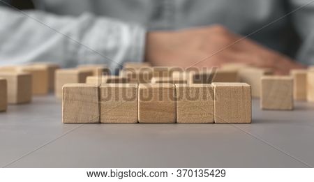 A Pile Of Empty Wood Block On Table. Top View. Business Concept For Growth Success Process. Copy Spa