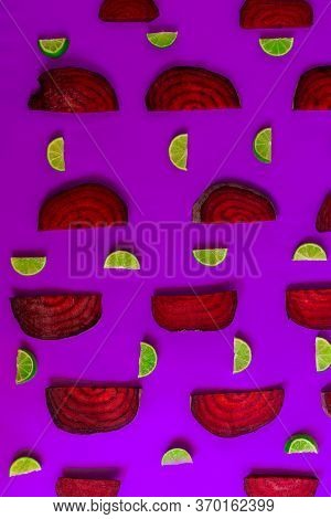 Chunks Of Beets On A Purple Background In Pattterns.