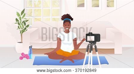 Woman Fitness Trainer Recording Video Blog Using Camera On Tripod Live Streaming Social Media Networ