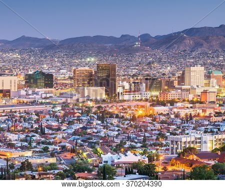 El Paso, Texas, USA  downtown city skyline at dusk with Juarez, Mexico in the distance.