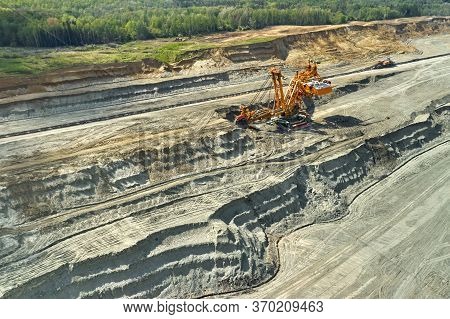 Bucket-wheel Excavator For Surface Mining In A Lignite Quarry, Heavy Industry Of Coal Mining.