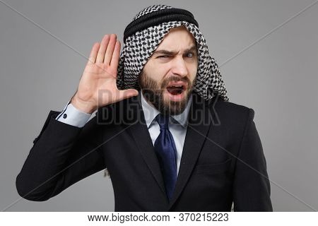 Curious Arabian Muslim Businessman In Keffiyeh Kafiya Ring Igal Agal Classic Black Suit Isolated On 