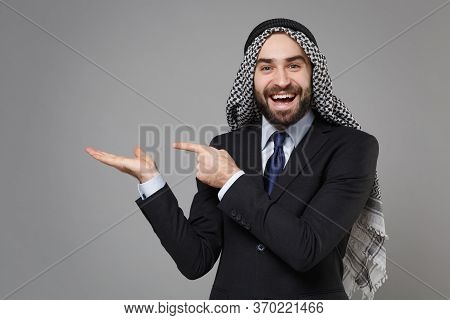 Laughing Bearded Arabian Muslim Businessman In Keffiyeh Kafiya Ring Igal Agal Classic Black Suit Iso