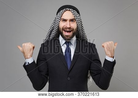 Cheerful Bearded Arabian Muslim Businessman In Keffiyeh Kafiya Ring Igal Agal Classic Black Suit Shi