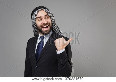 Cheerful Bearded Arabian Muslim Businessman In Keffiyeh Kafiya Ring Igal Agal Classic Black Suit Shi
