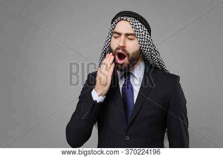 Tired Young Bearded Arabian Muslim Businessman In Keffiyeh Kafiya Ring Igal Agal Classic Suit Isolat
