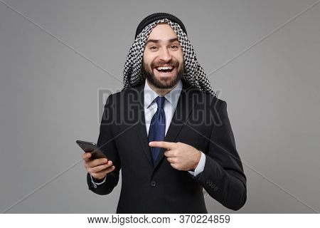 Funny Arabian Muslim Businessman In Keffiyeh Kafiya Ring Igal Agal Classic Black Suit Isolated On Gr