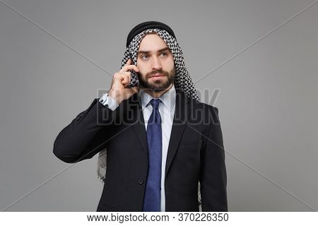 Serious Bearded Arabian Muslim Businessman In Keffiyeh Kafiya Ring Igal Agal Classic Black Suit Shir