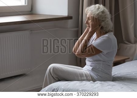 Senior Woman Feel Unhealthy Suffering From Migraine