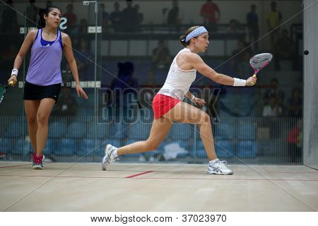 BUKIT JALIL, MALAYSIA - SEPTEMBER 11: Madeline Perry (white) defeats Delia Arnold at the CIMB Malaysian Open Squash Championship 2012 on September 11, 2012 at the National Squash Centre, Malaysia.