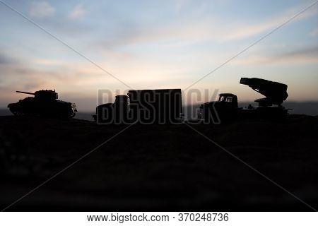 War Concept. Military Silhouettes Fighting Scene On War Fog Sky Background, World War Soldiers Silho