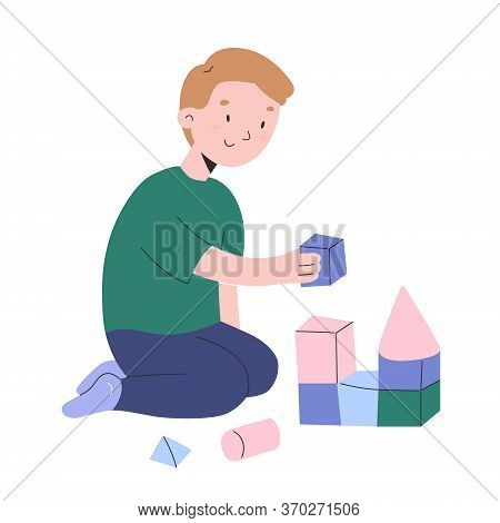 Little Boy Playing With Cubes, Toddler Boys Building A Tower With Wooden Bricks, Kindergarten Activi