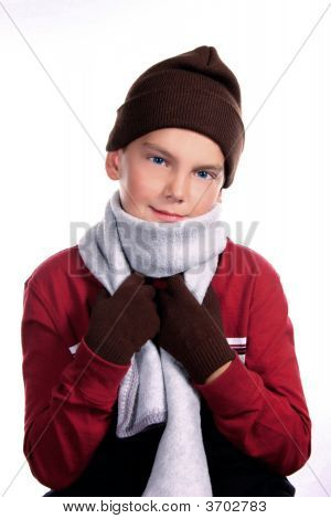 Young Child Bundled Up In Warm Winter Clothing