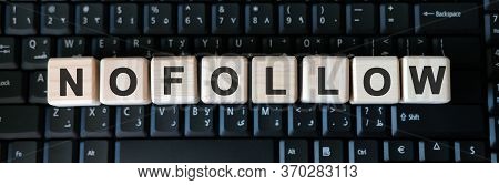 Nofollow Web Link - Business Concept Text On Wooden Cubes On Background Black Keyboard