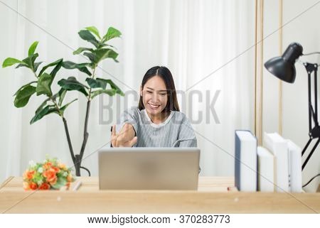Beautiful Young Asian Woman Using Video Conference Call To Friends,work From Home,work At Home